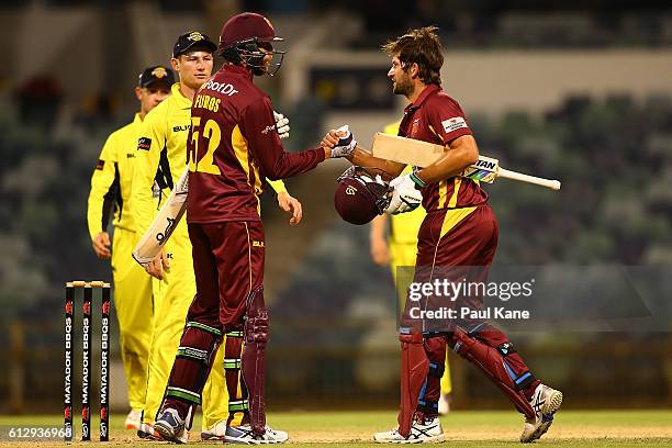 Jason Floros and Joe Burns of the Bulls celebrate after winning the Matador BBQs One Day Cup match between Western Australia and Queensland at WACA...