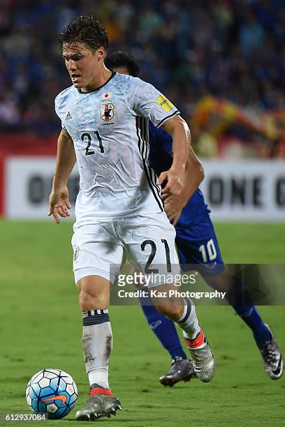 Gotoku Sakai of Japan dribbles the ball during the 2018 FIFA World Cup Qualifier between Thailand and Japan at on September 6, 2016 in Bangkok,...