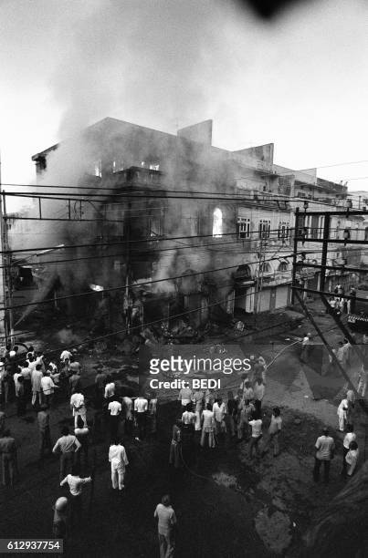 Building belonging to Sikhs burns 02 November 1984 in Daryaganj, the old part of New Delhi. Violence broke out in India in the wake of Prime Minister...