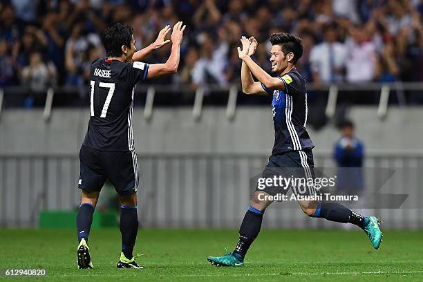 Hotaru Yamaguchi of Japan celebrates with Makoto Hasebe of Japan after scoring their second goal during the 2018 FIFA World Cup Qualifiers match...