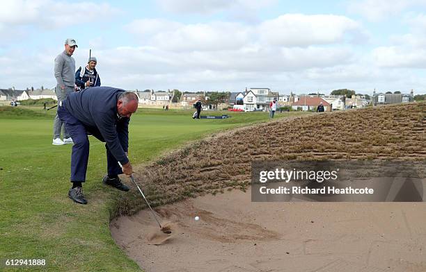 Andrew Chubby Chandler plays out of the bunker on the 16th hole during the first round of the Alfred Dunhill Links Championship on the Championship...