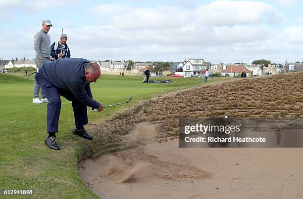 Andrew Chubby Chandler plays out of the bunker on the 16th hole during the first round of the Alfred Dunhill Links Championship on the Championship...