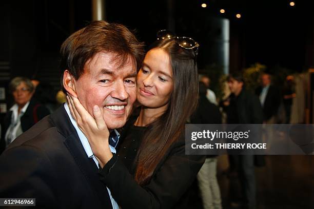 Former Belgian politician Bernard Wesphael and his daughter Saphia celebrate after Wesphael's acquittal for the murder of his wife on the twelfth day...