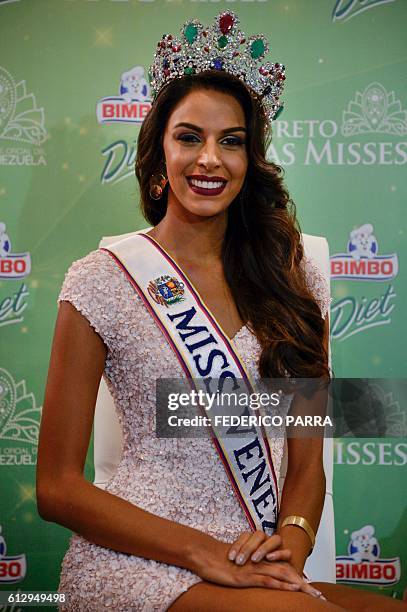 Keysi Sayago Miss Venezuela 2016, gestures during a press conference in Caracas on October 6, 2016. / AFP / FEDERICO PARRA
