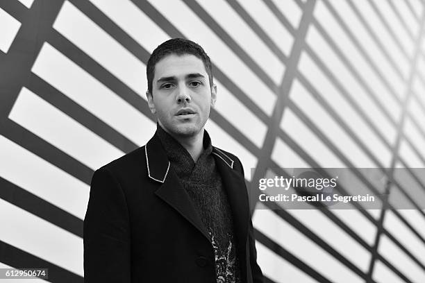 This image has been converted to Black and White. Xavier Dolan attends the Louis Vuitton show as part of the Paris Fashion Week Womenswear...