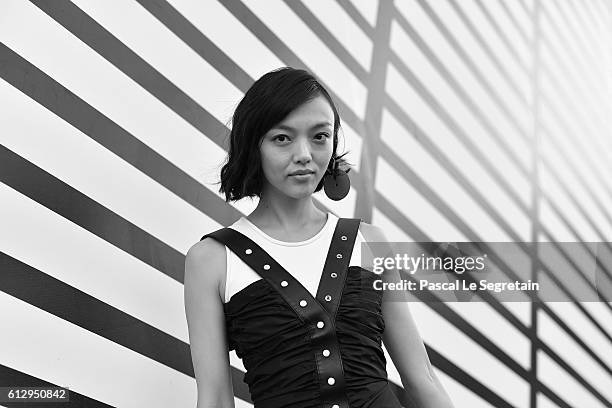 This image has been converted to Black and White. Rila Fukushima attends the Louis Vuitton show as part of the Paris Fashion Week Womenswear...