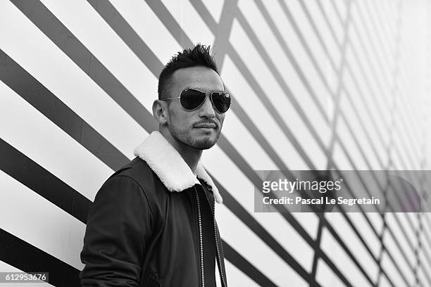 This image has been converted to Black and White. Hidetoshi Nakata attends the Louis Vuitton show as part of the Paris Fashion Week Womenswear...