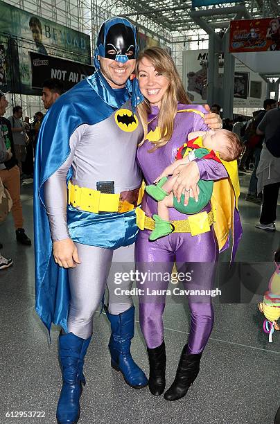 Cosplayers Jon Greer, Ashley Greer and son Grayson Greer dressed as Batman, Batgirl and Robin attend 2016 New York Comic Con - Day 1 on October 6,...