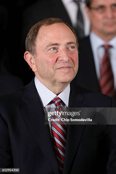 National Hockey League Commissioner Gary Bettman celebrates the Pittsburgh Penguin's Stanley Cup victory in the East Room of the White Hosue October...