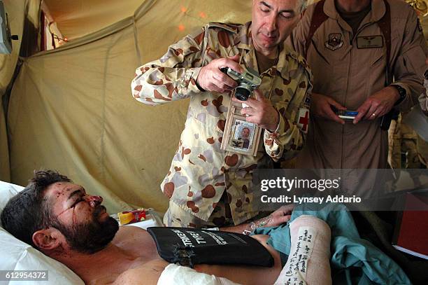 United States private contractor Jake Guevara is photographed by an Australian doctor in the Balad Air Force base in Iraq. Guevara, along with his...