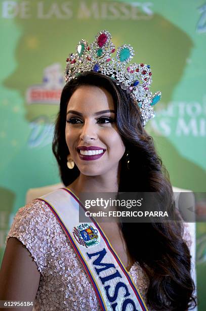 Keysi Sayago Miss Venezuela 2016, gestures during a press conference in Caracas on October 6, 2016. / AFP / FEDERICO PARRA