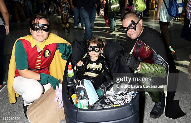 Natasha Gallo, Mia Gallo and Genaro Gallo dressed asRobin, Batgirl and Batman attend New York Comic Con - Day 1 on October 6, 2016 in New York City.