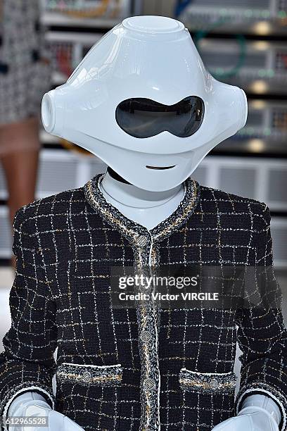 Model walks the runway during the Chanel Ready to Wear fashion show as part of the Paris Fashion Week Womenswear Spring/Summer 2017 on October 4,...