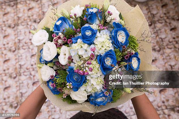 Pov Of Bouquet Of Blue Flowers High-Res Stock Photo