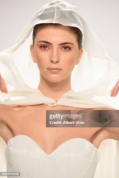 Model walks the runway at the Mark Zunino For Kleinfeld show during New York Fashion Week: Bridal at Kleinfeld on October 6, 2016 in New York City.