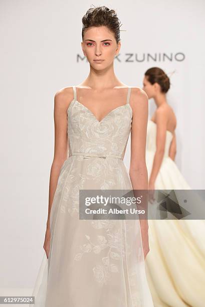 Model walks the runway at the Mark Zunino For Kleinfeld show during New York Fashion Week: Bridal at Kleinfeld on October 6, 2016 in New York City.