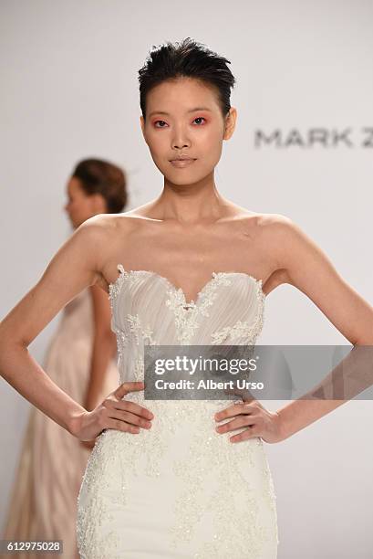 Model walks the runway at the Mark Zunino For Kleinfeld show during New York Fashion Week: Bridal at Kleinfeld on October 6, 2016 in New York City.