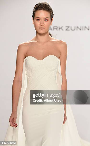 Model walks the runway at the Mark Zunino For Kleinfeld show during New York Fashion Week: Bridal at Kleinfeld on October 6, 2016 in New York City.