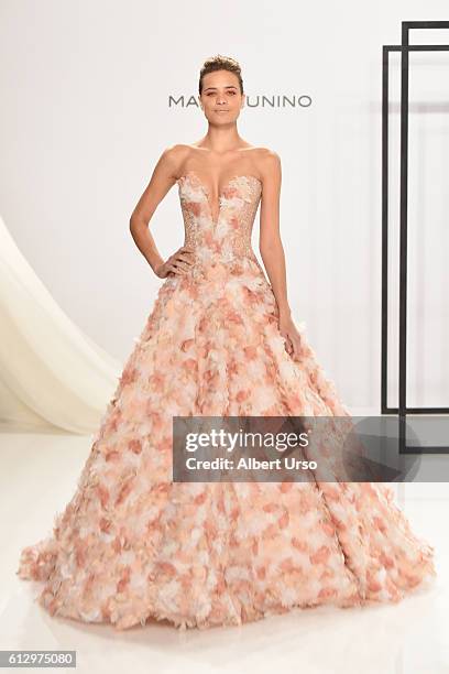 Model walks the runway at the Mark Zunino For Kleinfeld show during New York Fashion Week: Bridal at Kleinfeld on October 6, 2016 in New York City.