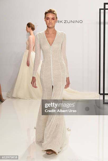 Model walks the runway at the Mark Zunino For Kleinfeld show during New York Fashion Week: Bridal at Kleinfeld on October 6, 2016 in New York City.