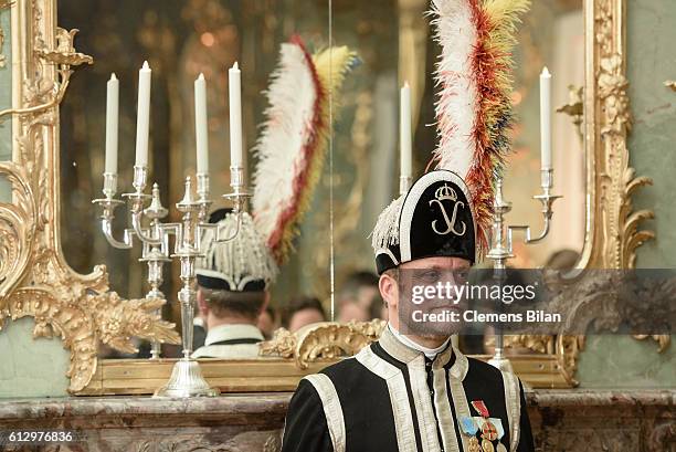Guard attends a banquet at Charlottenburg Palace on October 6, 2016 in Berlin, Germany. King Carl XVI Gustaf and Queen Silvia are on the second of a...