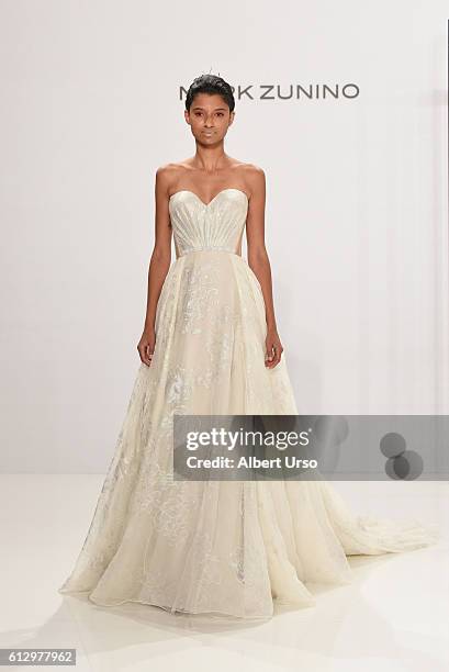 Model walks the runway at the Mark Zunino For Kleinfeld show during New York Fashion Week: Bridal at Kleinfeld on October 6, 2016 in New York City.