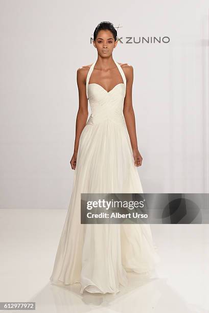 Model walks the runway at the Mark Zunino For Kleinfeld show during New York Fashion Week: Bridal at Kleinfeld on October 6, 2016 in New York City.