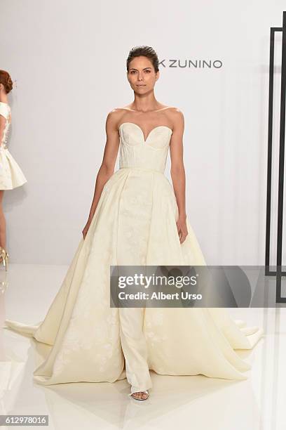 Model walks the runway at the Mark Zunino For Kleinfeld show during New York Fashion Week: Bridal at Kleinfeld on October 6, 2016 in New York City.