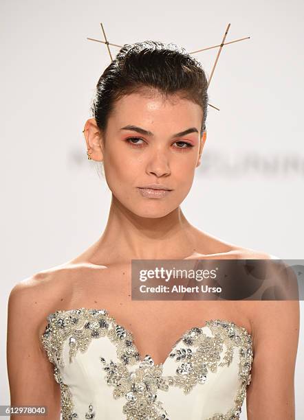 Model walks the runway at the Mark Zunino For Kleinfeld show during New York Fashion Week: Bridal at Kleinfeld on October 6, 2016 in New York City.