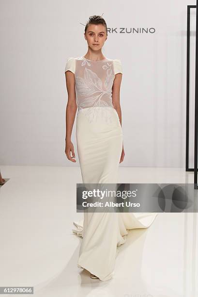 Model walks the runway at the Mark Zunino For Kleinfeld show during New York Fashion Week: Bridal at Kleinfeld on October 6, 2016 in New York City.