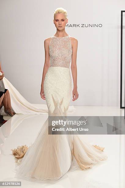 Model walks the runway at the Mark Zunino For Kleinfeld show during New York Fashion Week: Bridal at Kleinfeld on October 6, 2016 in New York City.