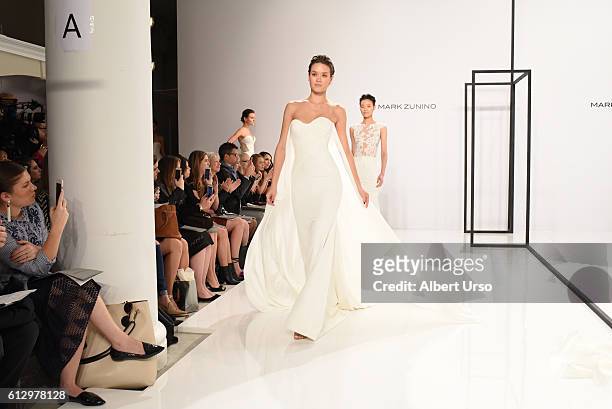 Models walk the runway at the Mark Zunino For Kleinfeld show during New York Fashion Week: Bridal at Kleinfeld on October 6, 2016 in New York City.