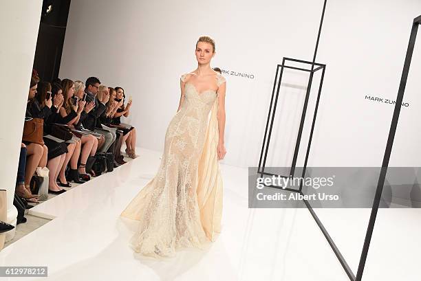 Models walk the runway at the Mark Zunino For Kleinfeld show during New York Fashion Week: Bridal at Kleinfeld on October 6, 2016 in New York City.