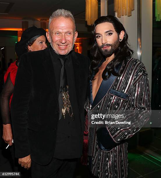Barbara Engel, Jean Paul Gaultier, and Conchita Wurst at 'THE ONE Grand Show' premiere at Friedrichstadt-Palast on October 6, 2016 in Berlin, Germany.