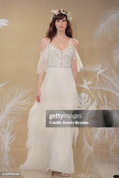 Model walks the runway during Theia at New York Fashion Week: Bridal October 2016 at THEIA's Showroom on October 6, 2016 in New York City.