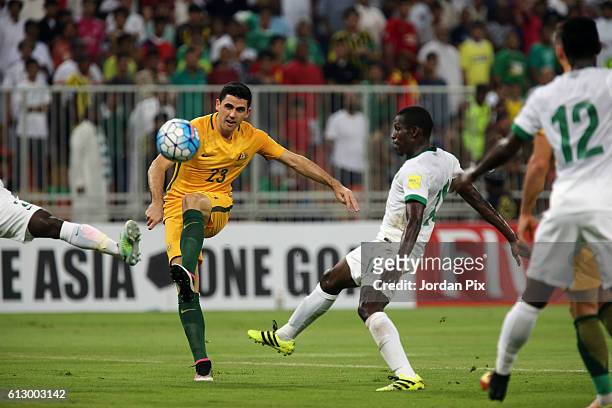 Australian player Tomas Rogic competes with Saudi Abdulamlek Al Khaibri during the match between Saudi Arabia and Australia for the FIFA World Cup...