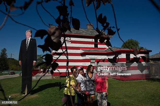 Trump supporters gather at the "Trump House" in Youngstown, Pennsylvania on October 6, 2016. Youngstown, Pennsylvania, in Westmoreland County is a...