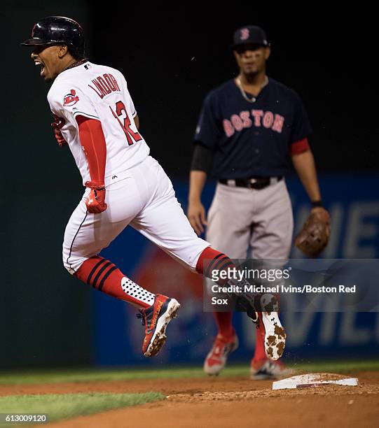 Francisco Lindor of the Cleveland Indians reacts after hitting a home run against the Boston Red Sox in the third inning of game one of the American...