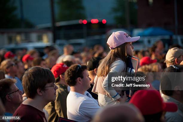 Supporters listen to Republican candidate for Vice President Mike Pence as he speaks to close to 250 supporters at a rally at JWF Industries in...