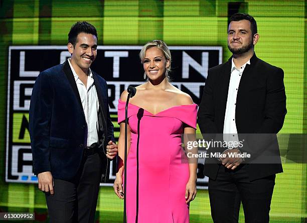 Recording artist Armando Ramos of Calibre 50, tv personality Rosie Rivera and recording artist Eden Munoz of Calibre 50 speak onstage during the 2016...