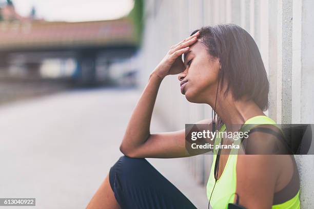 tired jogger - procrastination stock pictures, royalty-free photos & images