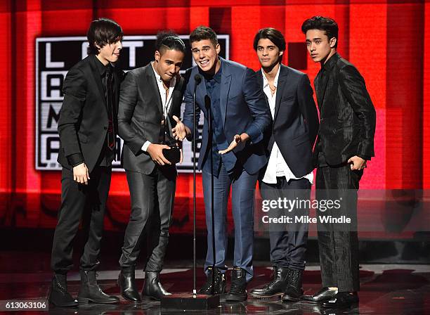 Recording artists Christopher Velez, Richard Camacho, Zabdiel De Jesus, Erick Brian Colon and Joel Pimentel of CNCO accept the award for New Artist...