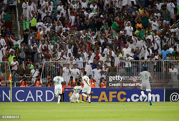 Saudi player Taiseer Al Jassam celebrates his goal during the match between Saudi Arabia and Australia for the FIFA World Cup Qualifier Russia 2018,...