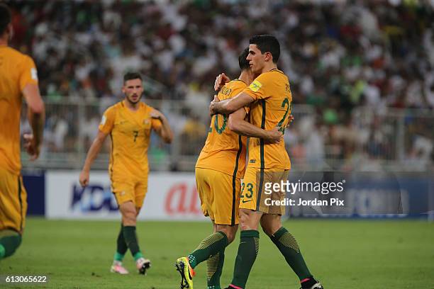 Australian players celebrate their second goal during the match between Saudi Arabia and Australia for the FIFA World Cup Qualifier Russia 2018, at...