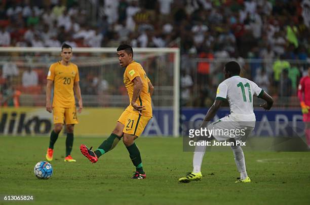 Australian player Massimo Luongo competes with Saudi Abdulamlek Al Khaibri during the match between Saudi Arabia and Australia for the FIFA World Cup...