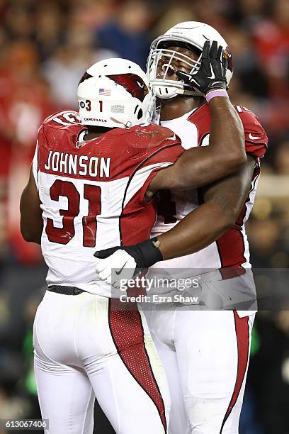 David Johnson of the Arizona Cardinals celebrates after a touchdown with D.J. Humphries during their NFL game against the San Francisco 49ers at...