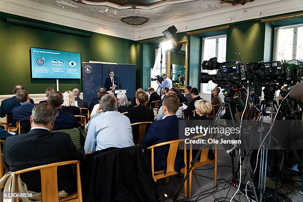 Karsten Lauritzen, Minister of Taxation , explains to the media the new taxation system for privately owned homes at a press conference in the...