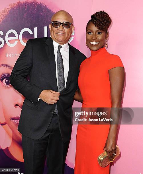 Larry Wilmore and Issa Rae attend the premiere of "Insecure" at Nate Holden Performing Arts Center on October 6, 2016 in Los Angeles, California.