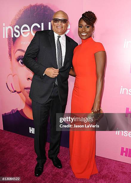 Larry Wilmore and Issa Rae attend the premiere of "Insecure" at Nate Holden Performing Arts Center on October 6, 2016 in Los Angeles, California.