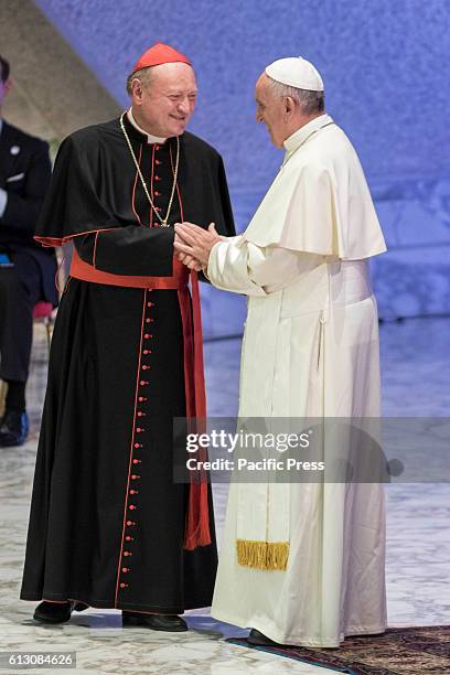 Pope Francis greets president of Vaticans Pontifical Council for Culture, Gianfranco Ravasi during the opening ceremony of the International...